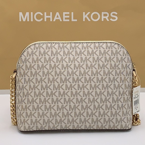 Michael Kors Medium Dome Xcross Xbody Bag
Color: Vanilla Multi - Picture 8 of 16